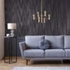 Real photo of dark living room interior with glass lamp, floral JUPITER OCEAN BLUE